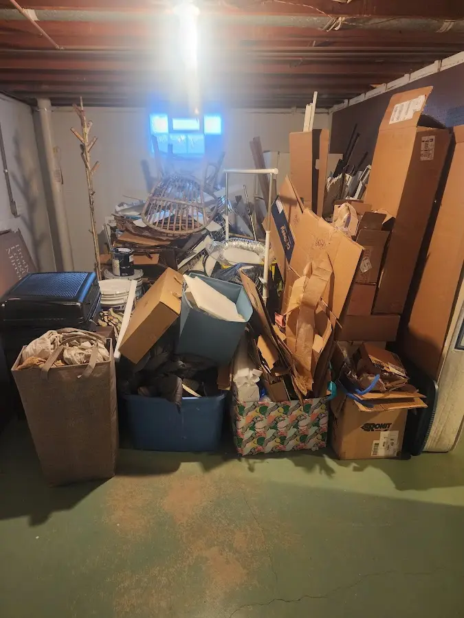 Roll-off dumpster container at job site for 4 Yard Dumpster Rental in Hurley